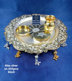 silver thali with gold polish